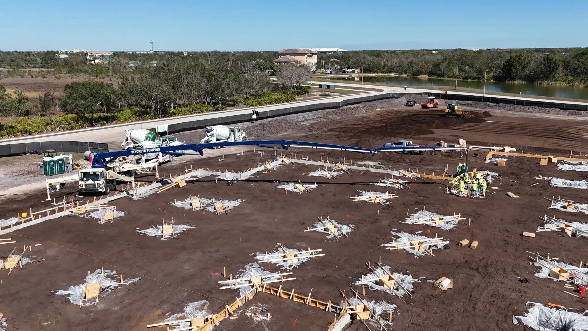 Aerial view of foundation pad preparation on a Southwest Structural project